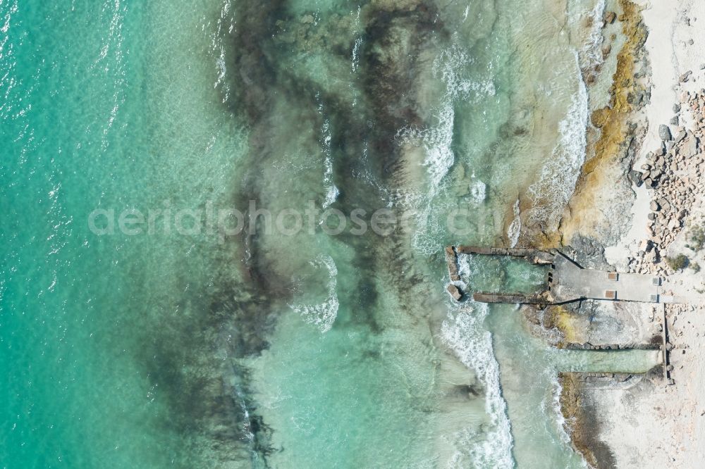 Vertical aerial photograph Llucmajo - Vertical aerial view from the satellite perspective of the Water surface at the seaside of mediteran sea in Llucmajor, beach es Trenc, man in the water, in Balearic Islands, Spain