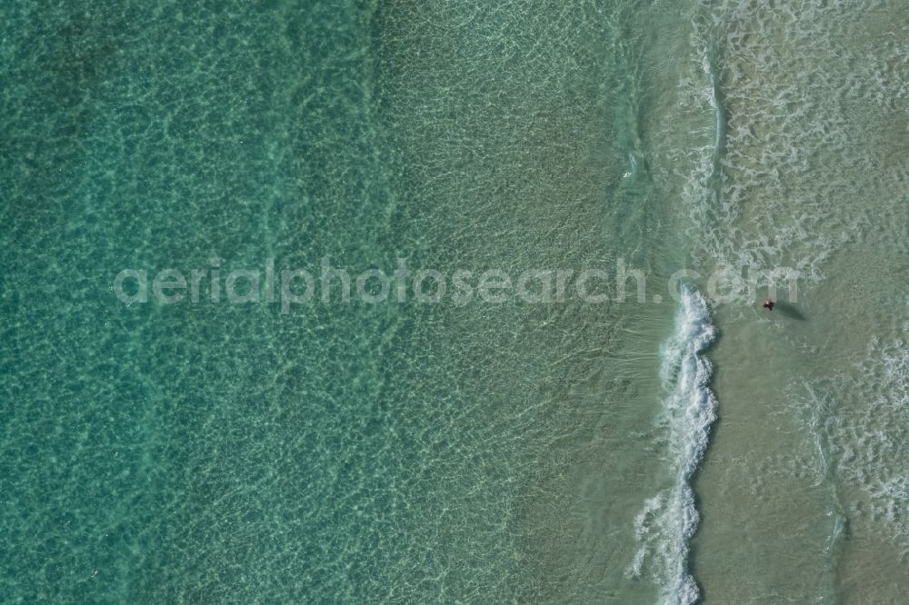 Vertical aerial photograph Llucmajo - Vertical aerial view from the satellite perspective of the Water surface at the seaside of mediteran sea in Llucmajor, beach es Trenc, man in the water, in Balearic Islands, Spain