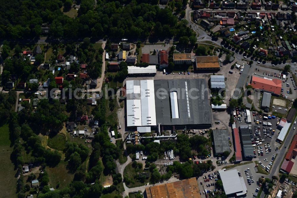 Vertical aerial photograph Biesenthal - Vertical aerial view from the satellite perspective of the building and production halls on the premises of of Moebelfolien GmbH in Biesenthal in the state Brandenburg, Germany