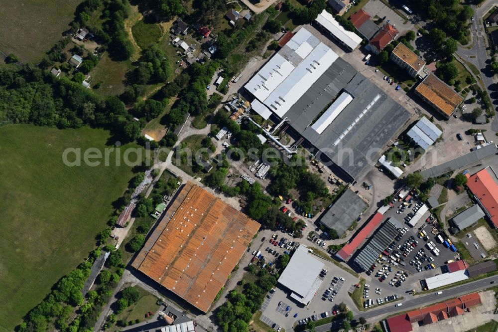 Vertical aerial photograph Biesenthal - Vertical aerial view from the satellite perspective of the building and production halls on the premises of of Moebelfolien GmbH in Biesenthal in the state Brandenburg, Germany