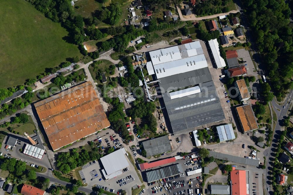 Vertical aerial photograph Biesenthal - Vertical aerial view from the satellite perspective of the building and production halls on the premises of of Moebelfolien GmbH in Biesenthal in the state Brandenburg, Germany