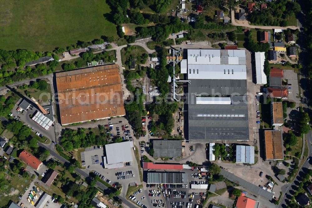 Vertical aerial photograph Biesenthal - Vertical aerial view from the satellite perspective of the building and production halls on the premises of of Moebelfolien GmbH in Biesenthal in the state Brandenburg, Germany