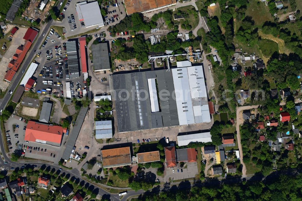 Vertical aerial photograph Biesenthal - Vertical aerial view from the satellite perspective of the building and production halls on the premises of of Moebelfolien GmbH in Biesenthal in the state Brandenburg, Germany