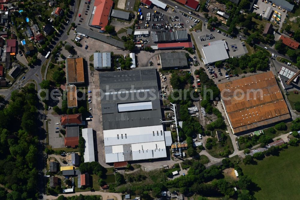 Vertical aerial photograph Biesenthal - Vertical aerial view from the satellite perspective of the building and production halls on the premises of of Moebelfolien GmbH in Biesenthal in the state Brandenburg, Germany